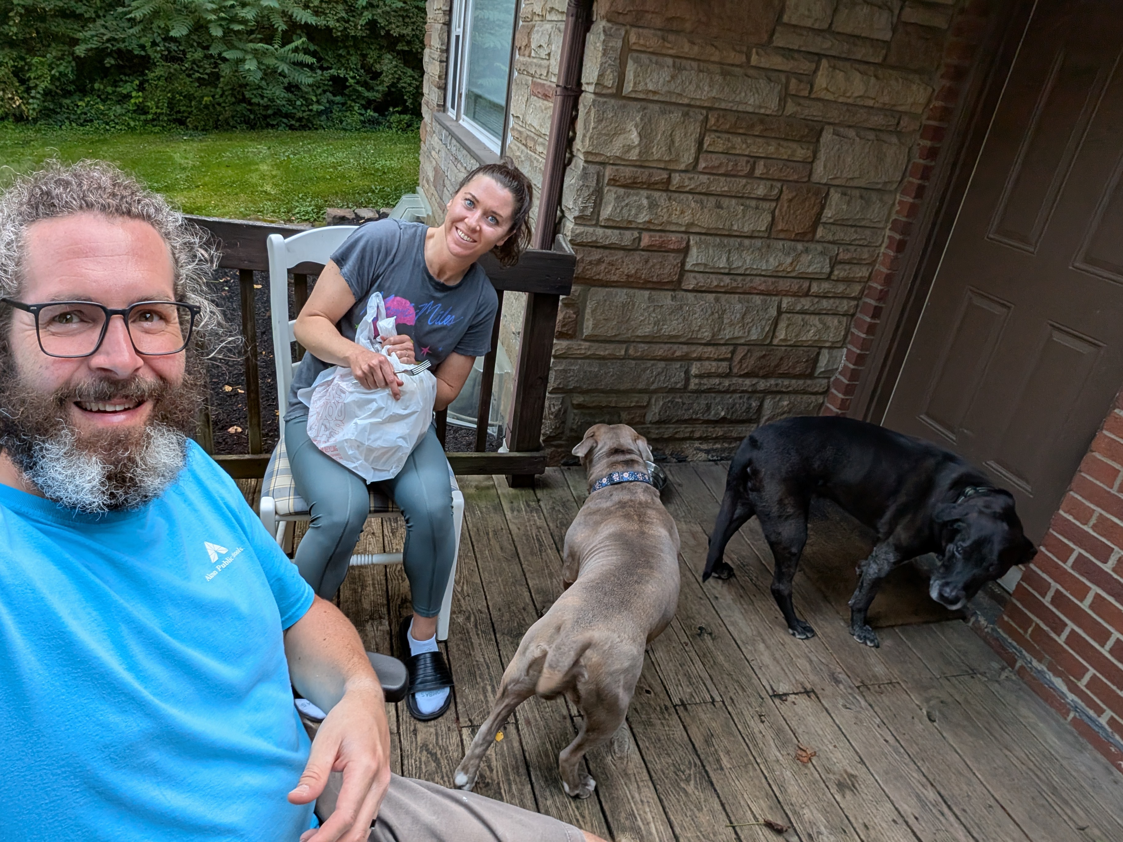 Family with dogs on the couch